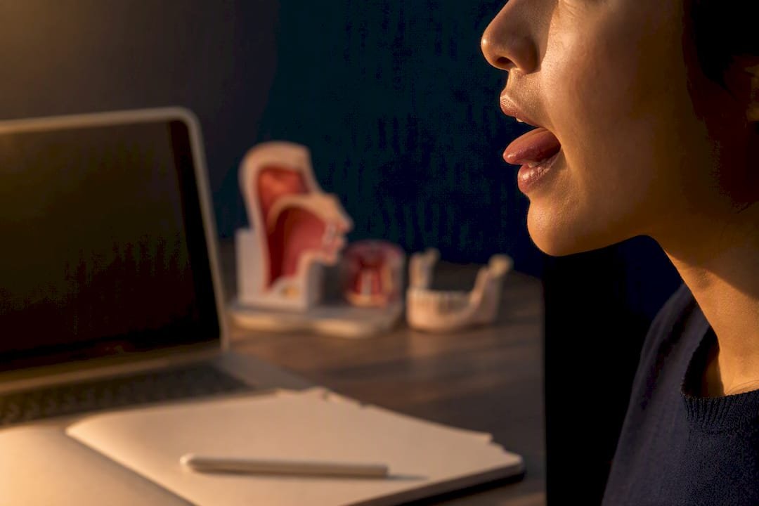 Close-up of jaw and tongue showing American t sound articulation