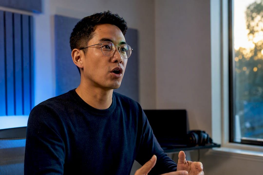 ESL learner practicing American pronunciation in coaching room