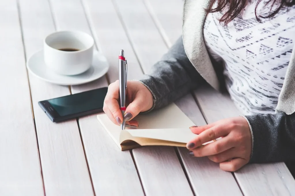 Woman, write, notepad - 10–20 Min/Day: Master IPA for American English with InPronunci
