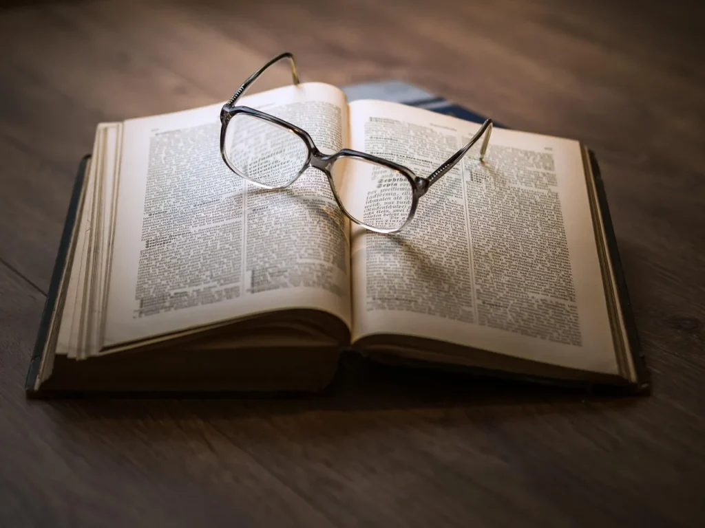 Glasses, book, education - How Linguists Design Pronunciation Courses
