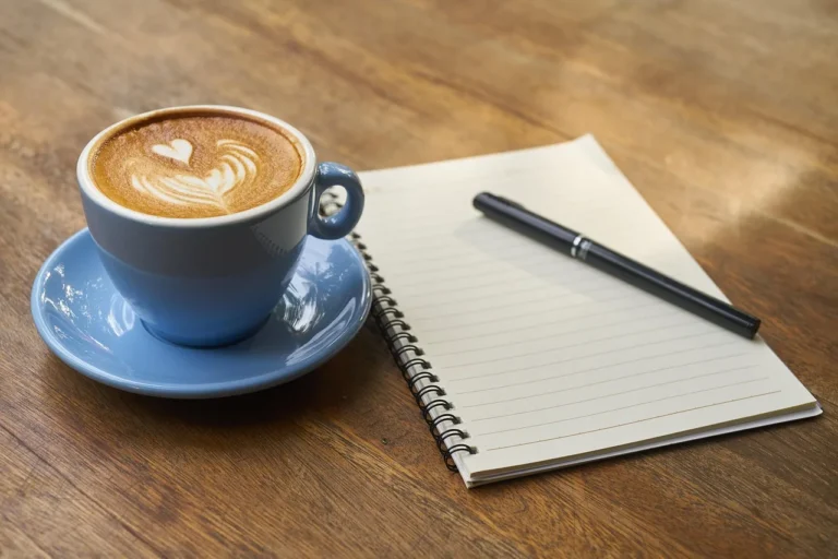 Coffee, pen, notebook - Why Daily Pronunciation Practice Matters