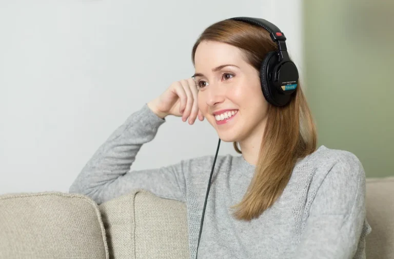 Woman, headphones, music - Why Pronunciation Affects Listening Comprehension