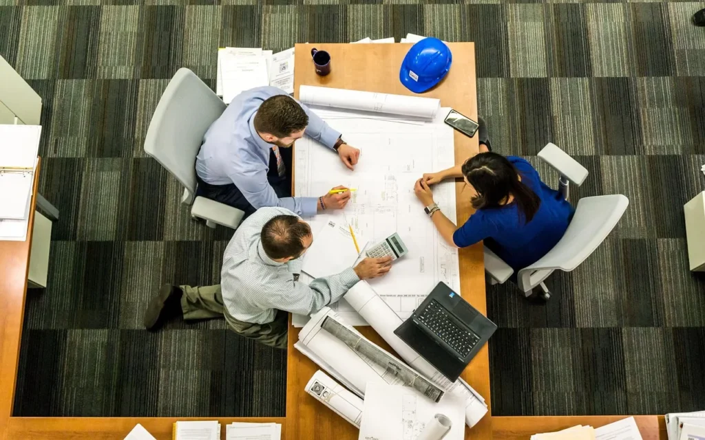 Meeting, business, architect - Why Pronunciation Affects Team Communication